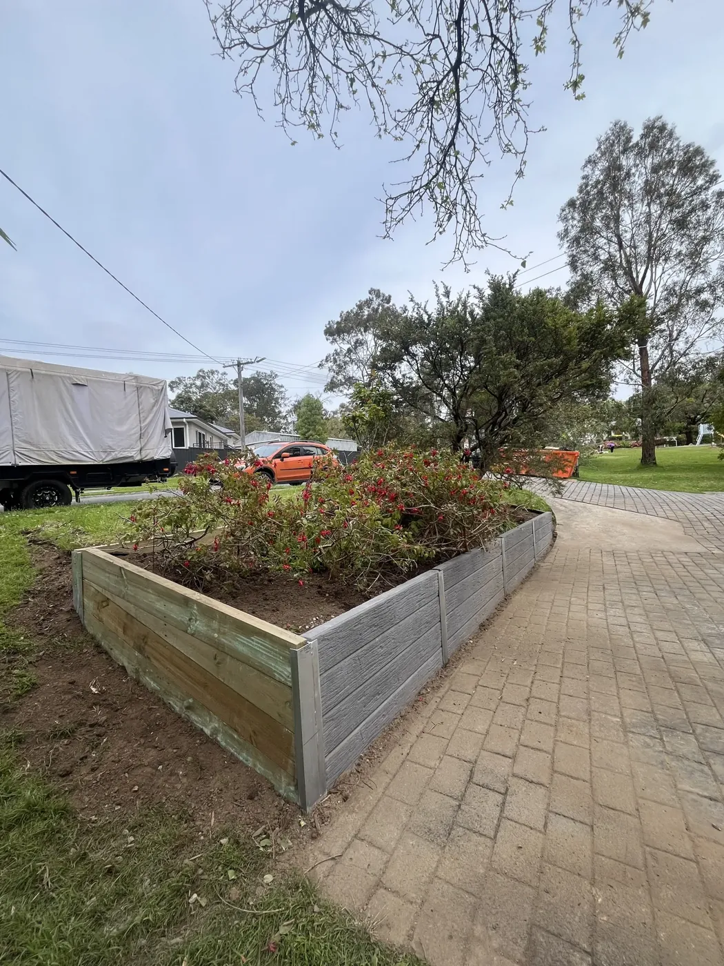 Concrete sleeper garden retaining wall
